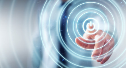 Businessman pushing 3D render power button with his finger