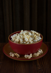 popcorn in a red bowl