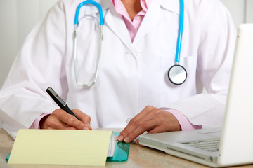 Doctor woman working in clinic.