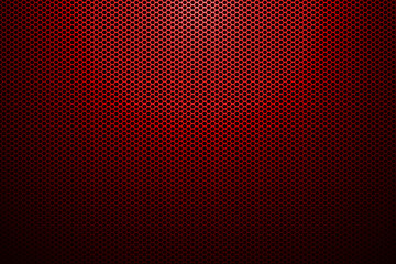 Obraz premium spotlight on red metallic mesh background.