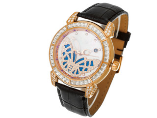 Female wrist watch dial with butterfly from diamond.