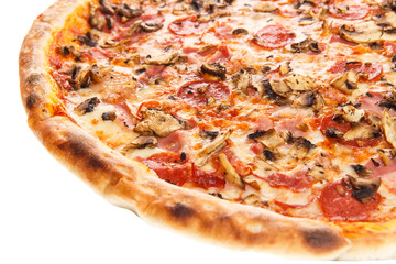 Fragment of delicious classic italian Pizza Carbonara with ham, sausages tomatoes, mushrooms and cheese