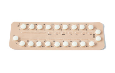 Colorful oral contraceptive pill strips isolated on white background with clipping path. birth...