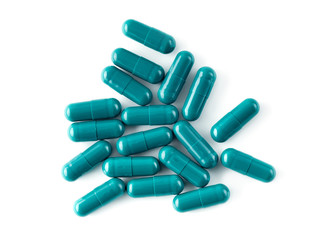 Aluminium blister pack of pills. The capsules are packaged in blisters, isolated on a white background. Disease. Flu. Medications.