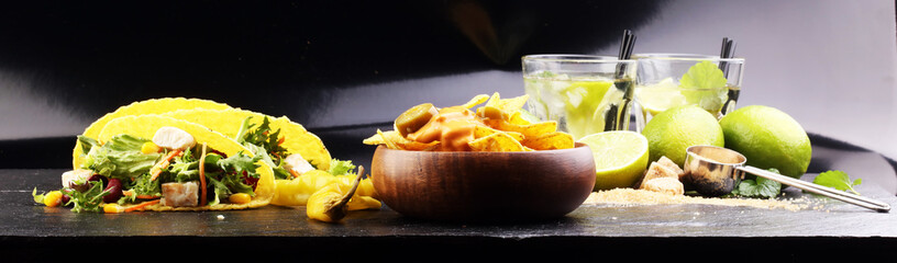 Caipirinha of Brazil, tacos and delicious nachos with melted che