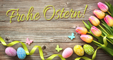 Easter background with colorful eggs and spring tulips