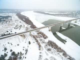 Aerial view of snow covered countryside