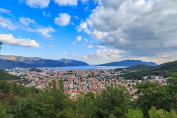 Fototapeta na wymiar Marmaris cityscape during day time with clouds.