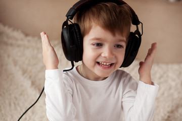 handsome boy listening to music on headphones