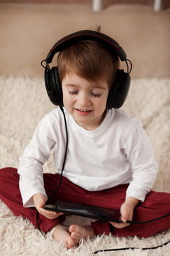 handsome boy listening to music on headphones