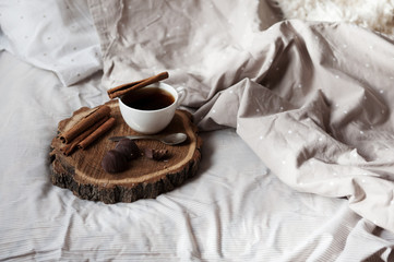 Obraz na płótnie Canvas on the bed is a tray of coffee