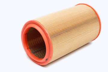 Round car engine air filter isolated over white background