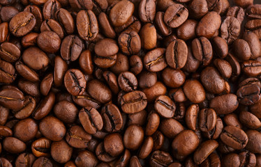 roasted coffee beans isolated in white background. Roasted coffee beans background close up. Coffee beans pile from top on white background with copy space for text. Good morning.