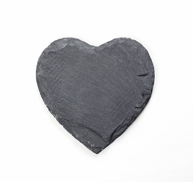 Stone heart on white background