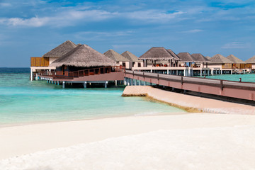 Water bungalows resort at islands. Indian Ocean, Maldives