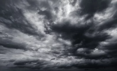 Dramatic thunderstorm clouds background at dark sky