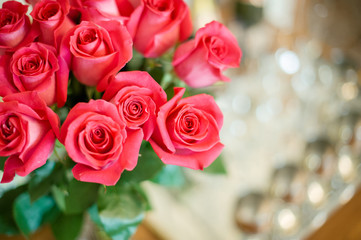 bridal bouquet and newlyweds rings.