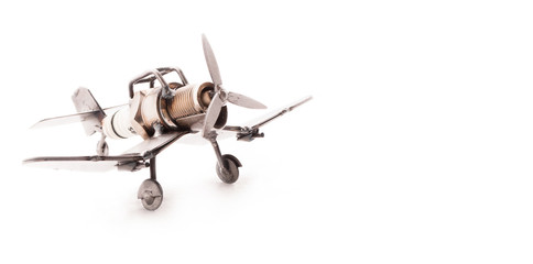 Airplane Toy Handmade From Waste Materials Isolated On A White Background