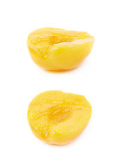 Canned peach half isolated