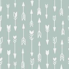 Seamless hand drawn geometric tribal pattern with arrows. Vector navajo design.