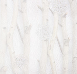 Christmas background of birch branches and snowflake ornaments w