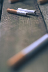 Cigarettes on a wooden board