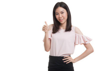 Young Asian business woman show thumbs up.