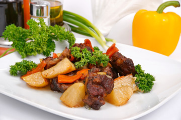lamb with vegetables and greens