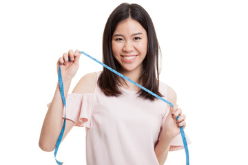 Young Asian business woman with measuring tape.