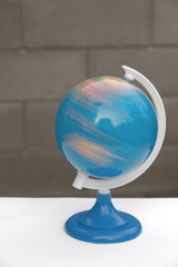 Spinning terrestrial globe illustrating globalization or travel concepts