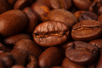 Coffee beans macro background.