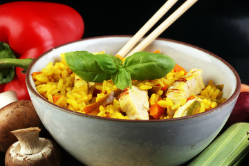 Homemade Chinese fried rice with vegetables, chicken and fried e