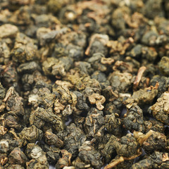 Surface coated with tea leaves