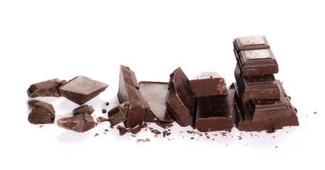 chocolate bars and chopped isolated on white