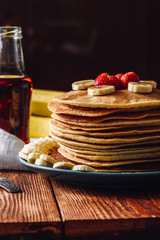 Homemade Pancakes with Maple Syrup and Fruits