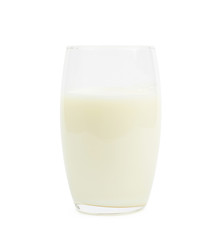 Tall glass filled with milk isolated