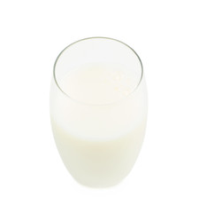 Tall glass filled with milk isolated