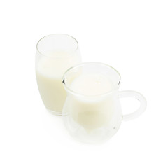 Obraz na płótnie Canvas Two glasses of milk isolated