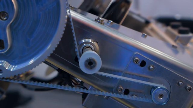 The drive of the gear, pulley and belt allows to change the position of the node in electronic equipment. Actuator of satellite antenna for ocean yacht