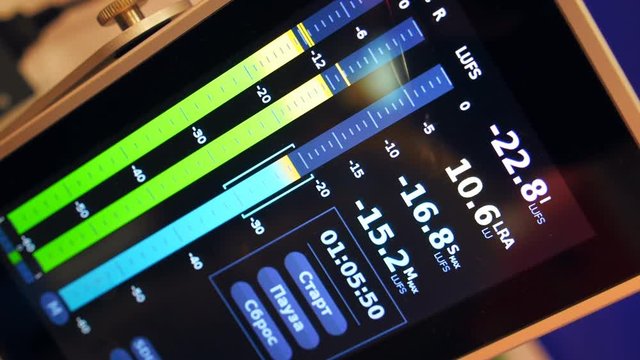 Professional audio equipment with illuminated recording level indicator