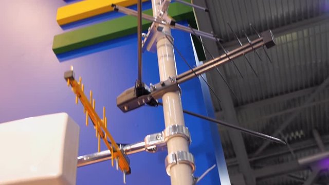 The mast with a large variety of TV and radio antennas