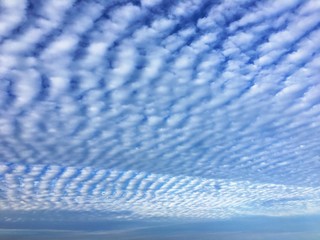 Obraz premium Cirrocumulus clouds form a herringbone or mackerel sky