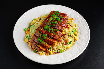 Chinese style Egg fried rice with sliced pork fillet
