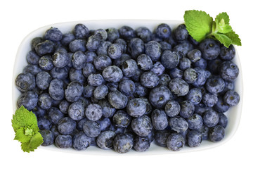 Blueberries on white background from above