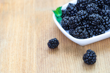 Blackberries on wooden deck no lines