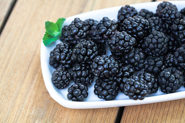 Blackberries on wooden deck healthy