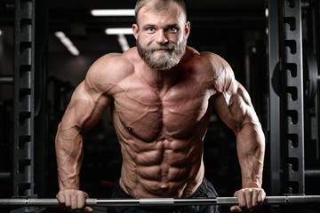 brutal muscular man with beard unshaven fitness model healthcare