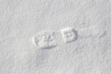 Single foot step on snow ground.