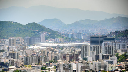 Aerial view from Santa Teresa hill to Sao Cristovao, Maracana and Tijuca neighborhoods, football Stadium and Tijuca Forest National Park of Northern Zone of Rio de Janeiro, Brazil
