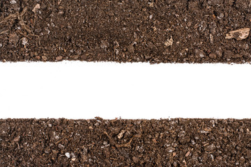 Fertile soil texture background seen from above, top view. Gardening or planting concept. Frame or border isolated on white